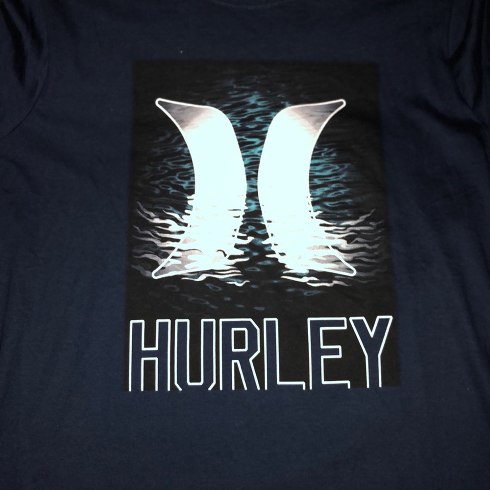 A large in men’s navy blue shirt